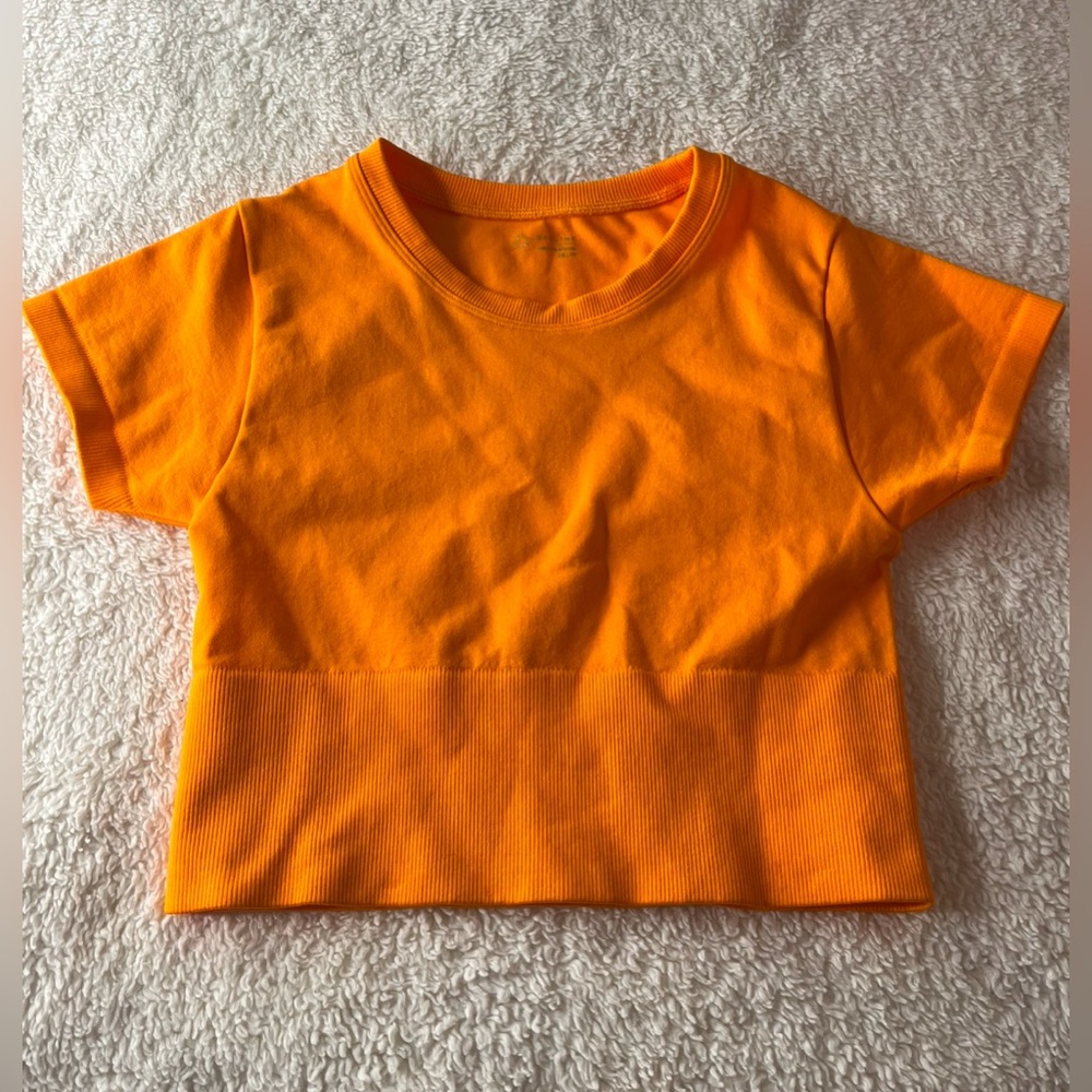 orange cropped top shirt